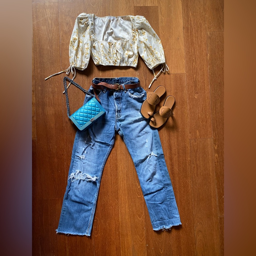 Vintage Levi’s button up heavily worn out 24 waist  cropped fit cheeky!